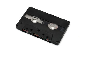 Compact audio tapes for magnetic recording on a white background.Compact cassettte