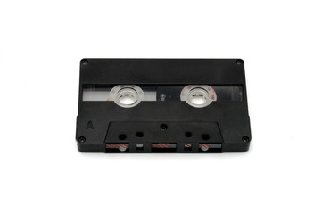 Compact audio tapes for magnetic recording on a white background.Compact cassettte