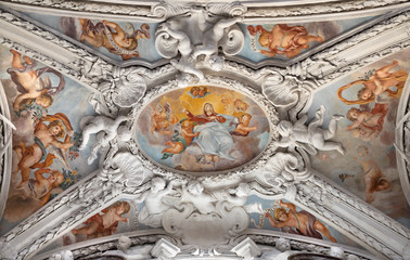COMO, ITALY - MAY 10, 2015: The baroque fresco of Assumption of Virgin Mary in side nave of church Chiesa di San Agostino by Morazzone from 16. cent.