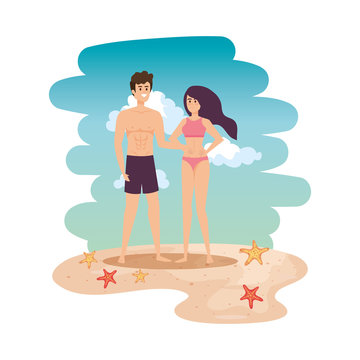 young couple with swimsuit on the beach