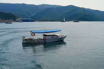 Fototapeta na wymiar Clear water of the Mediterranean and yachts in Marmaris, Turkey