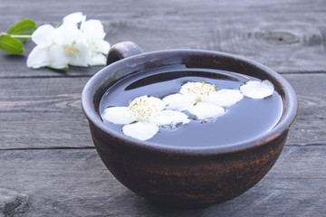 Jasmine flowers float on water. Relaxation concept