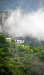 Fototapeta na wymiar house in the top of mountain