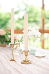 Beautiful decoration set for wedding party. Design by flower, variety luxury glass and candle.