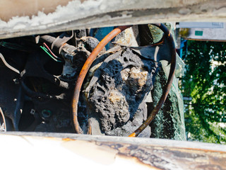 the blown-up car, the consequences of terrorism and vandalism
