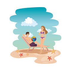 young couple relaxing in chair with balloon toy on the beach