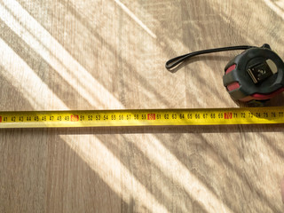 Measuring tape. Measuring centimeters in the close-up. Construction tool.