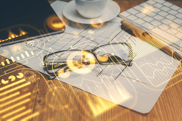 Tech theme hologram with glasses on the table background. Technology concept. Double exposure.