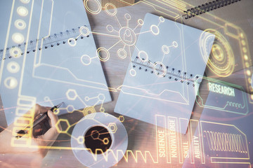 Multi exposure of woman's writing hand on background with data technology hud. Concept of...