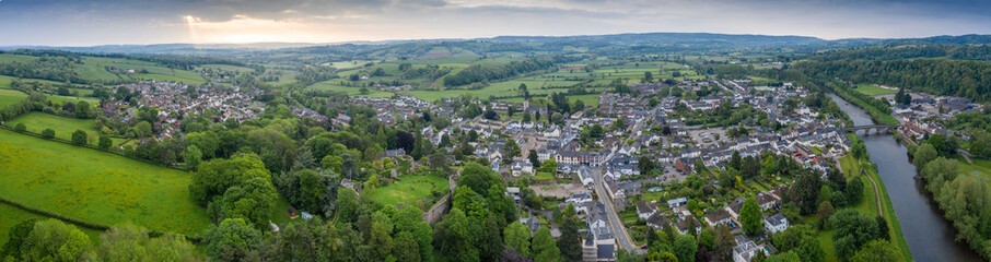 Fototapeta premium Dawn aerial panoramic view of the picturesque village of Usk in Gwent, South Wales, UK