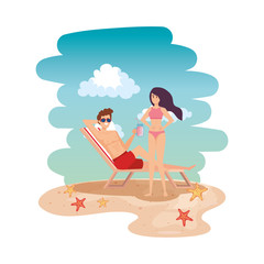 young couple relaxing in chair drinking juice on the beach