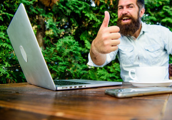 thumb up. brutal bearded hipster at coffee break. office worker. Successful businessman. agile business. Business success. perfect deal. happy man working on laptop. Welcome on board