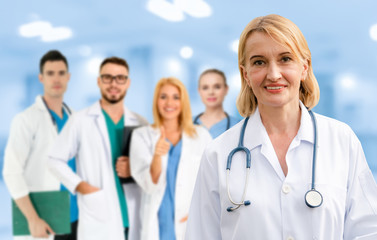 Healthcare people group. Professional doctor working in hospital office or clinic with other...