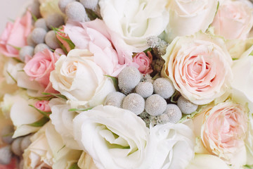 Background of a bouquet of roses and eustoma, macro, close up.
