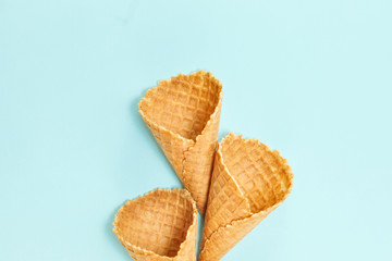 Ice cream cones pattern. Waffle cones on  Background. Minimal composition.