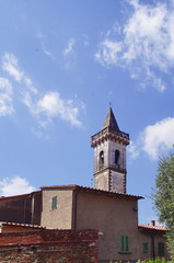 Fototapeta na wymiar Bell tower of the Holy Cross church, Vinci, Tuscany, Italy
