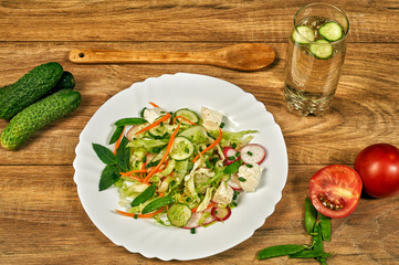 Spring salad of cucumbers and cabbage . Healthy eating concept