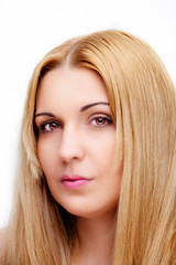 Naklejka premium A portrait of beautiful face with beautiful brown eyes - isolated on white.