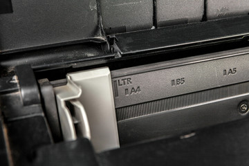 Close up of printer printing documents
