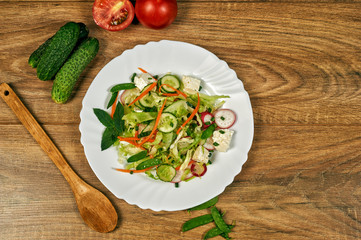 Spring salad of cucumbers and cabbage . Healthy eating concept