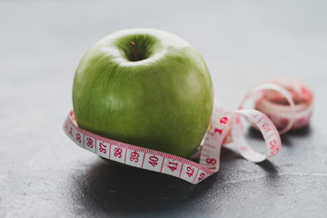 Tape measure around an apple