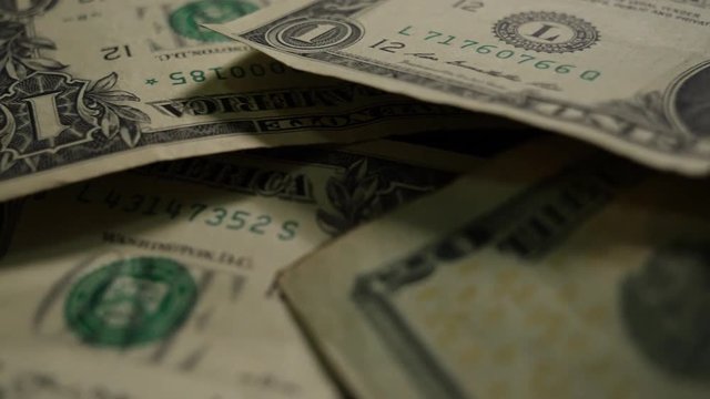 Dollar bills, money background. Dollars money set with count to bills of one hundred dollars. Closeup on the bills for a hundred dollars. Dollars, money close up.