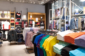 Minsk, Belarus - May 29, 2019: interior shot of racks with shirts and undershirts