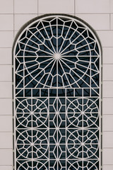 beautiful ornament on the window of the building.