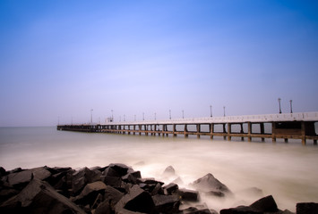 Old pier at Promenade Beach. Rock Beach is the popular stretch of beachfront in the city of Puducherry, India, along the Bay of Bengal