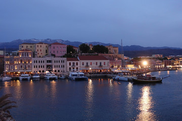Naklejka na ściany i meble Night shot from iconic Venetian port of Chania, Crete island, Greece