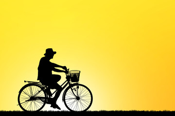 Obraz premium Cycling Silhouette on sunrise background