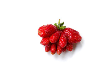 Ugly organic strawberry isolated on white background.