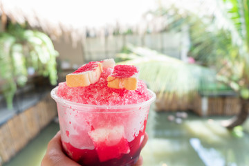 Clear ice, red water