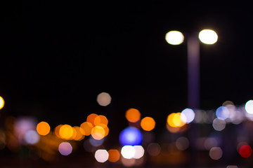 night city light unfocused blurred bokeh from street lantern and lamps illumination 