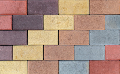 Obraz premium The texture of the brick wall of different colors for construction. Facing building material.