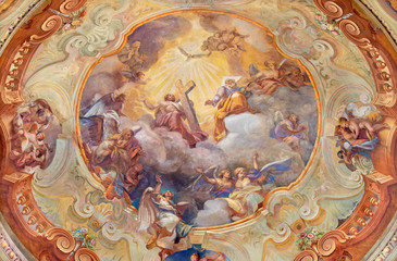 COMO, ITALY - MAY 8, 2015: The ceiling fresco Glory of Holy Trinity in church Santuario del Santissimo Crocifisso by Gersam Turri (1927-1929).