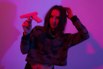 photo of girl in pink purple light rap style