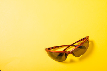 Sunglasses on retro color background. Fashion concept
