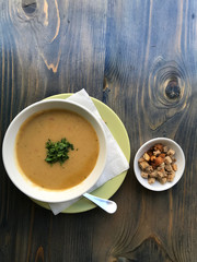 Delicious cream soup for lunch served with croutons