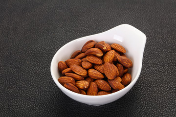 Almonds nuts heap