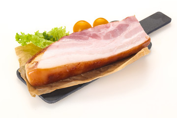 Smoked pork breast with salad leaves