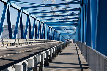 modern bridge construction and road going through the bridge