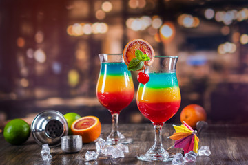 Summer rainbow layered cocktail