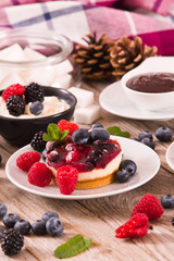 Cheesecakes with mixed berries.