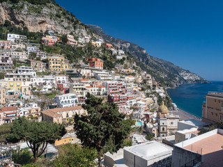 Beautiful panoramic view of the beach anf colorful buildings in Positano at Amalfi Coast, Italy....