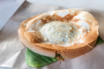 Penang famous apom manis, Served on banana leaf.