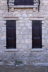 Fototapeta na wymiar old windows and ancient wall in Turkey