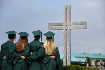 Graduates with cross
