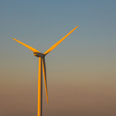 Wind Turbines At Sunset