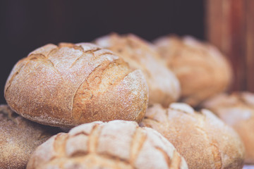 Baked loaves of bread close up.